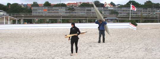 Kayaks carried to the beach