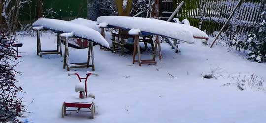 Snow on the kayaks